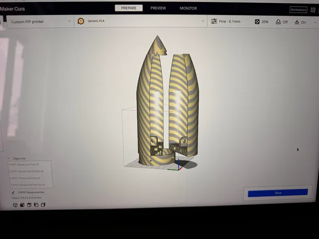 Nose cone sections modelled as separate parts, open in the Cura slicer on a laptop screen