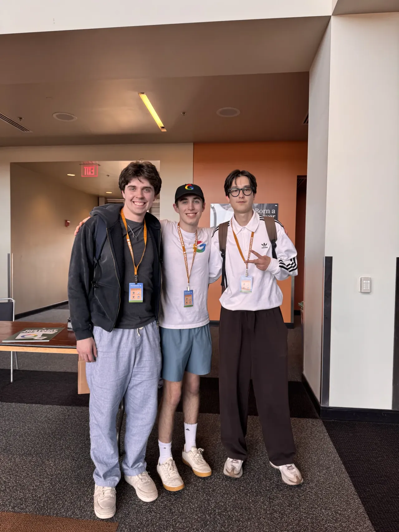 Jakhangir with his teammate and the Google track presenter at BeaverHacks 2026